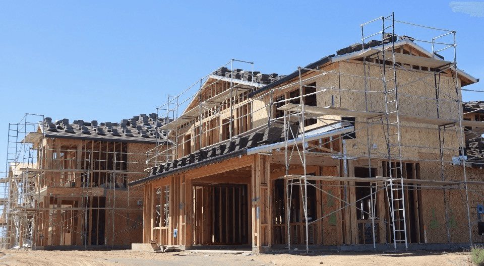 Residential framing and construction under scaffolding