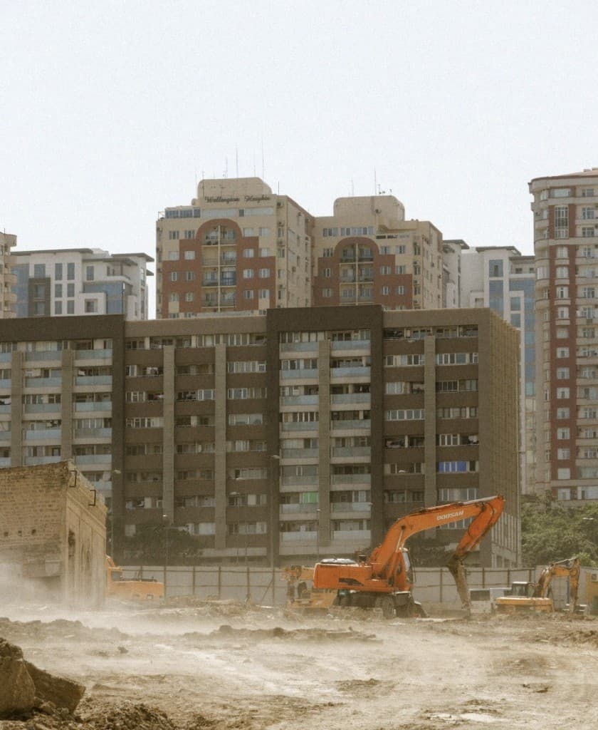 Urban redevelopment site with heavy equipment